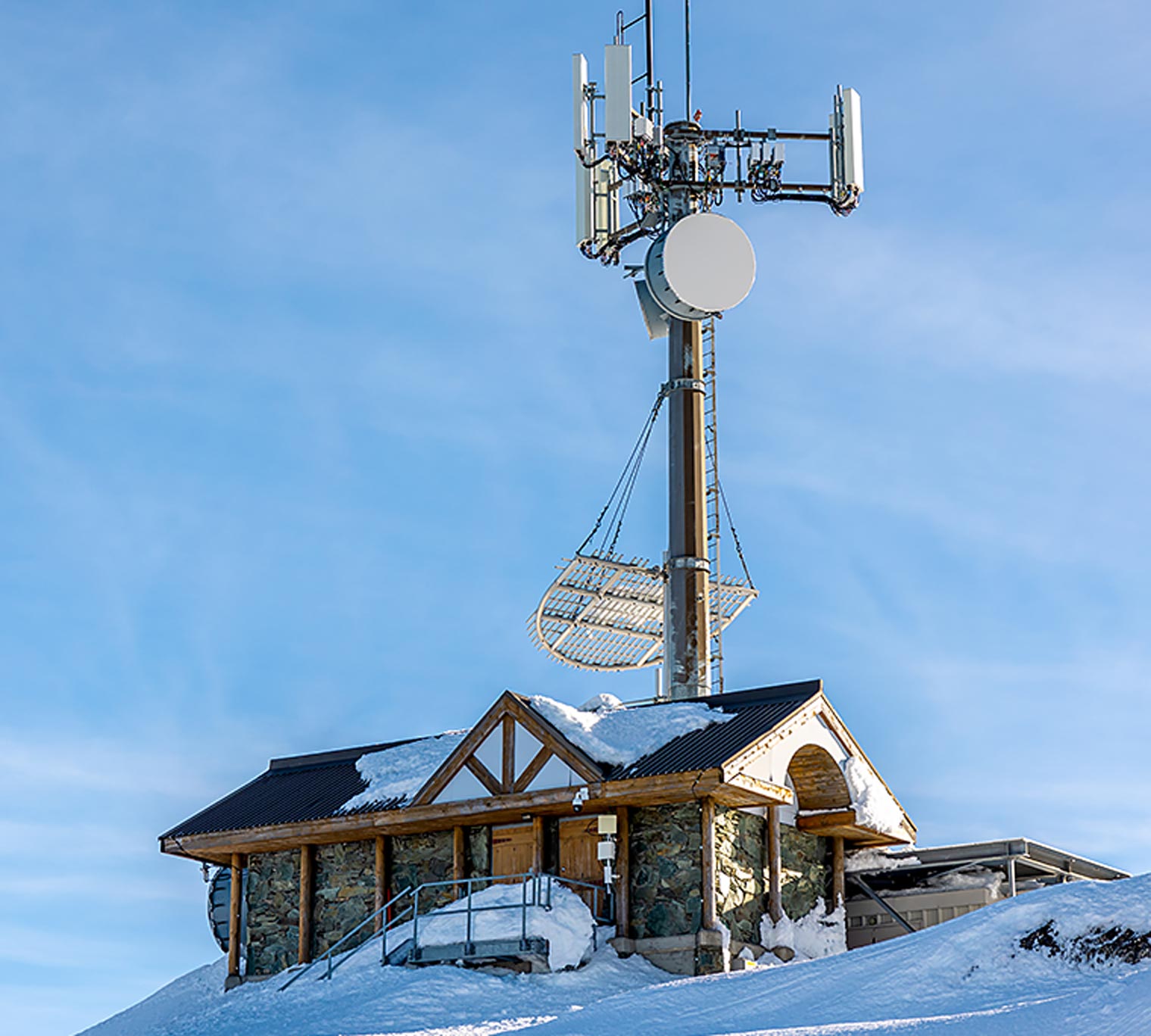 Communication tower at ski resort in winter.