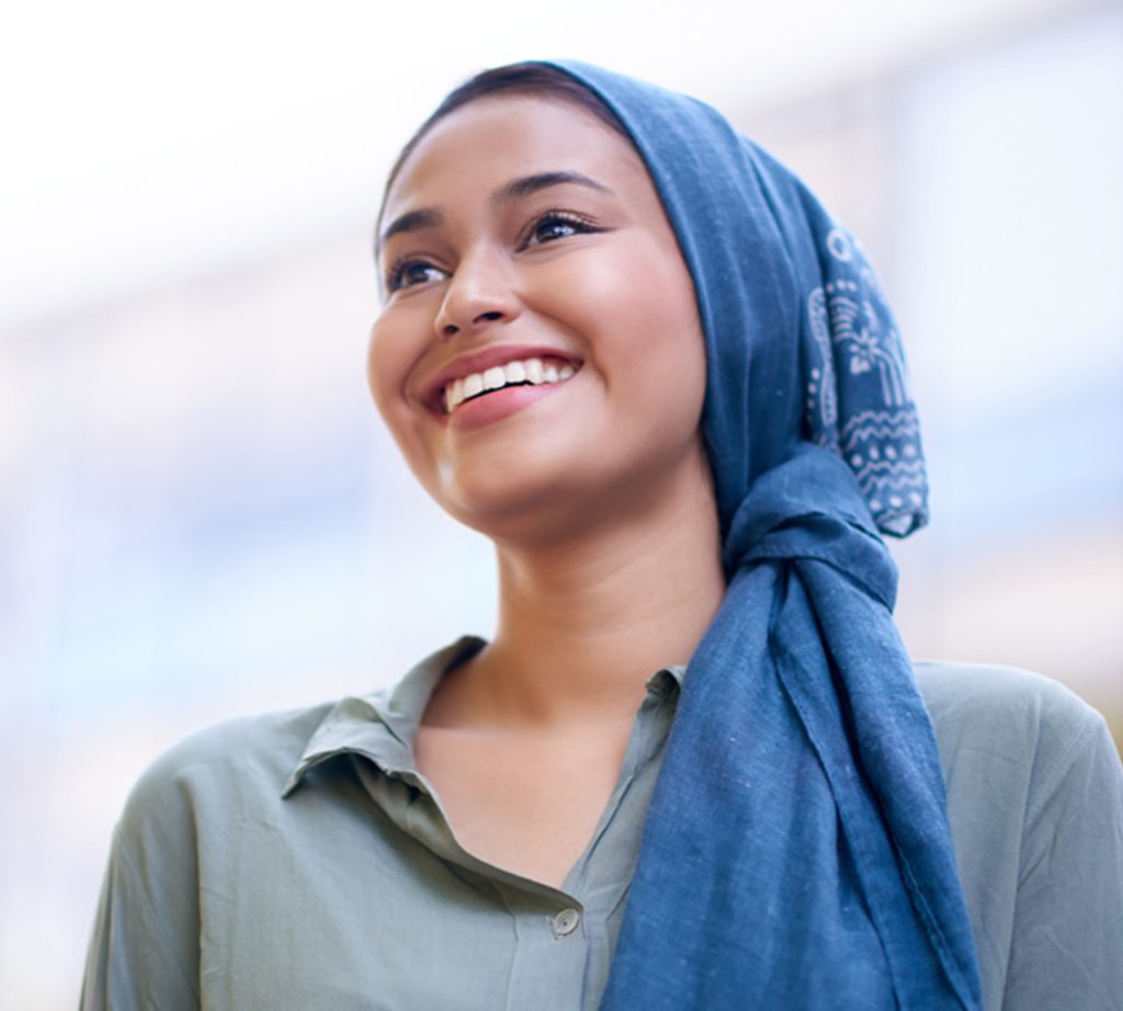 woman smiling, student, immigrant, person smiling