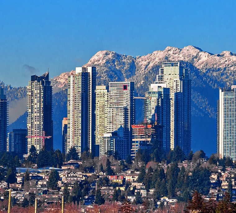 vancouver cityscape buildings and mountains