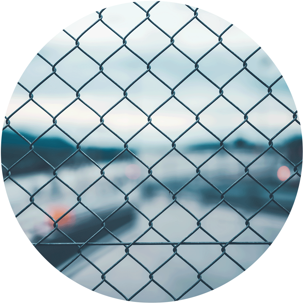 Looking through a chain link fence