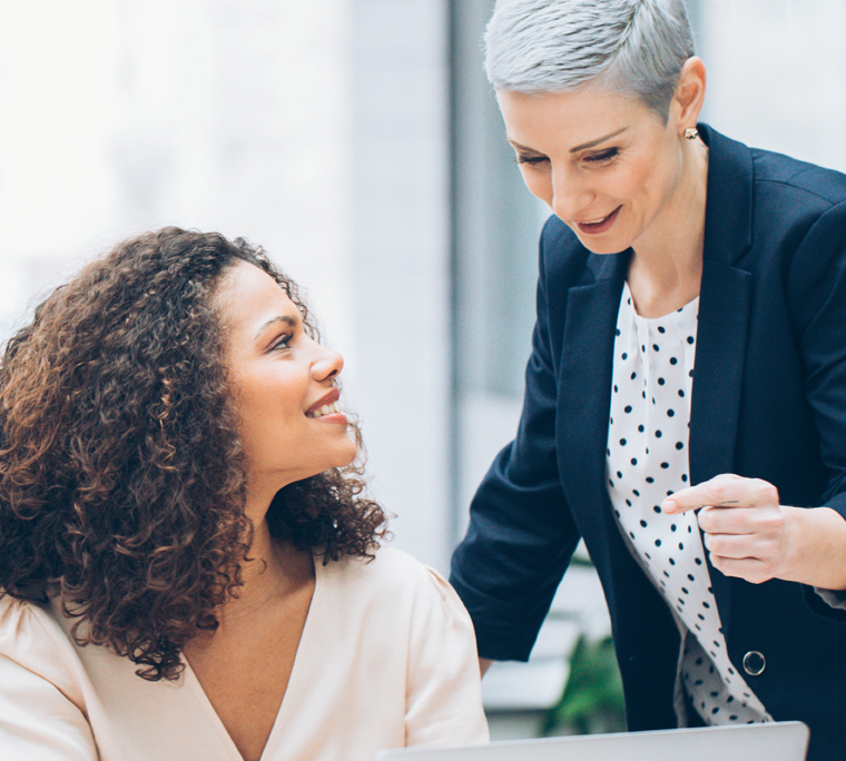 Two business colleagues talking