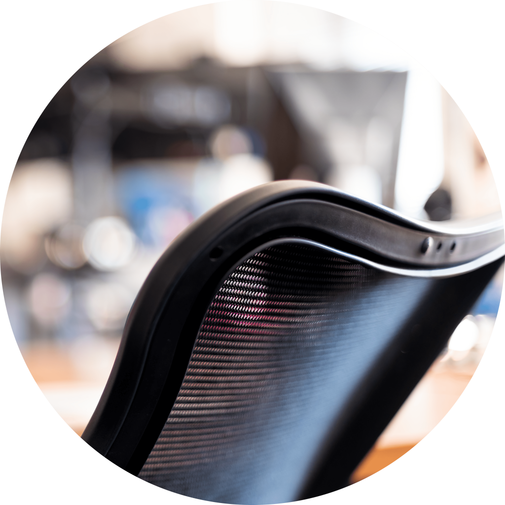 Closeup of black office chair in home office