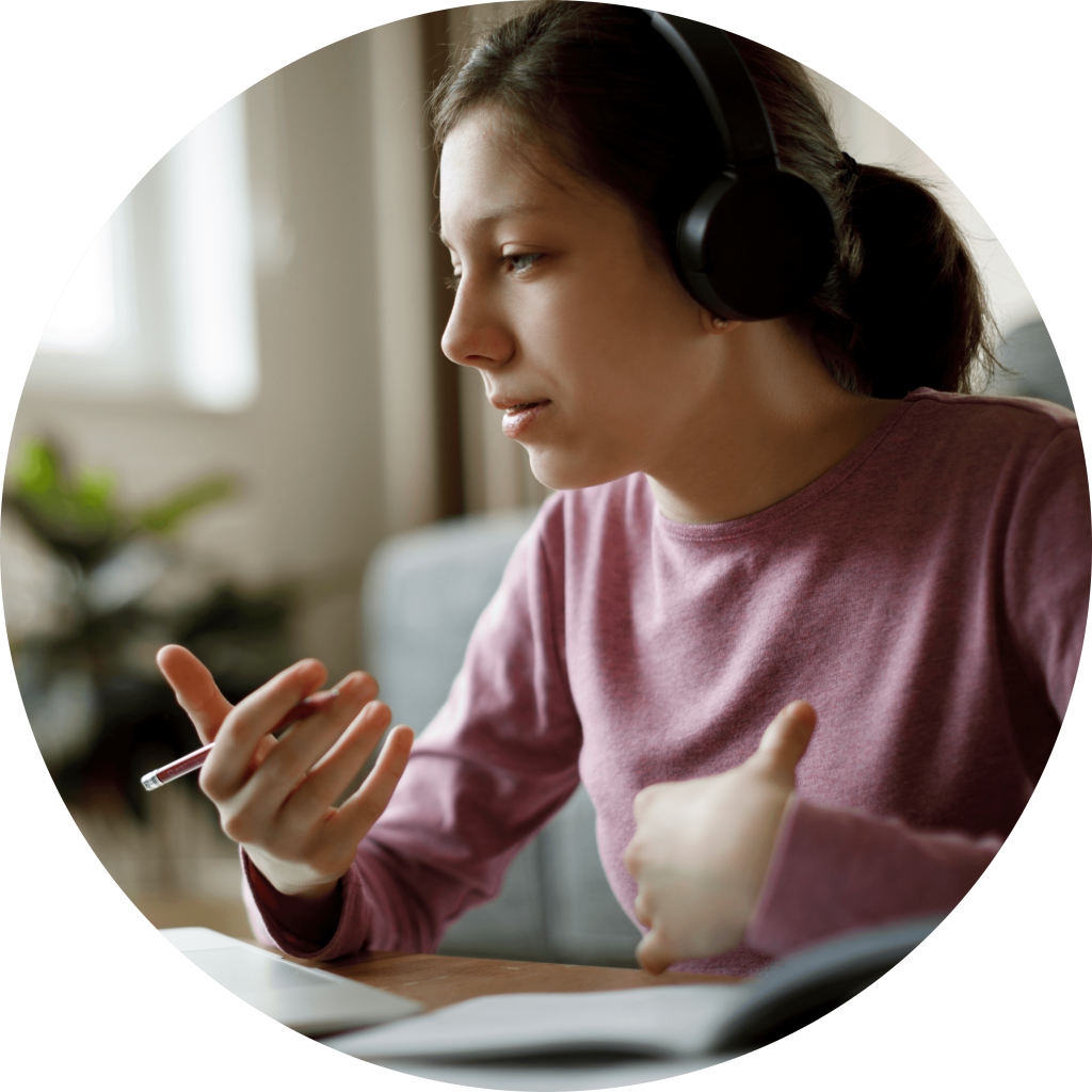 Teenager with headphones online learning from home